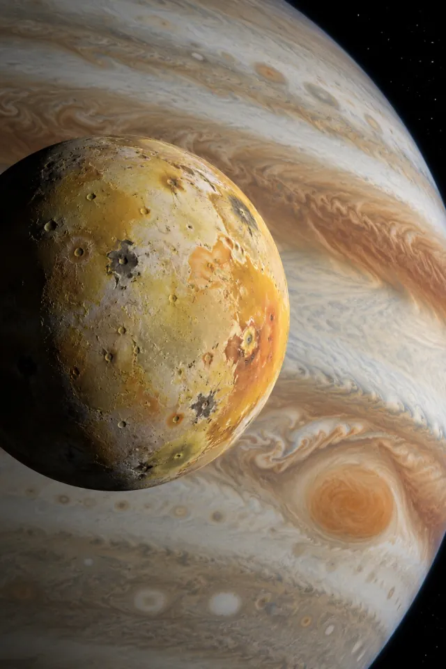 Io beside Jupiter’s Clouds