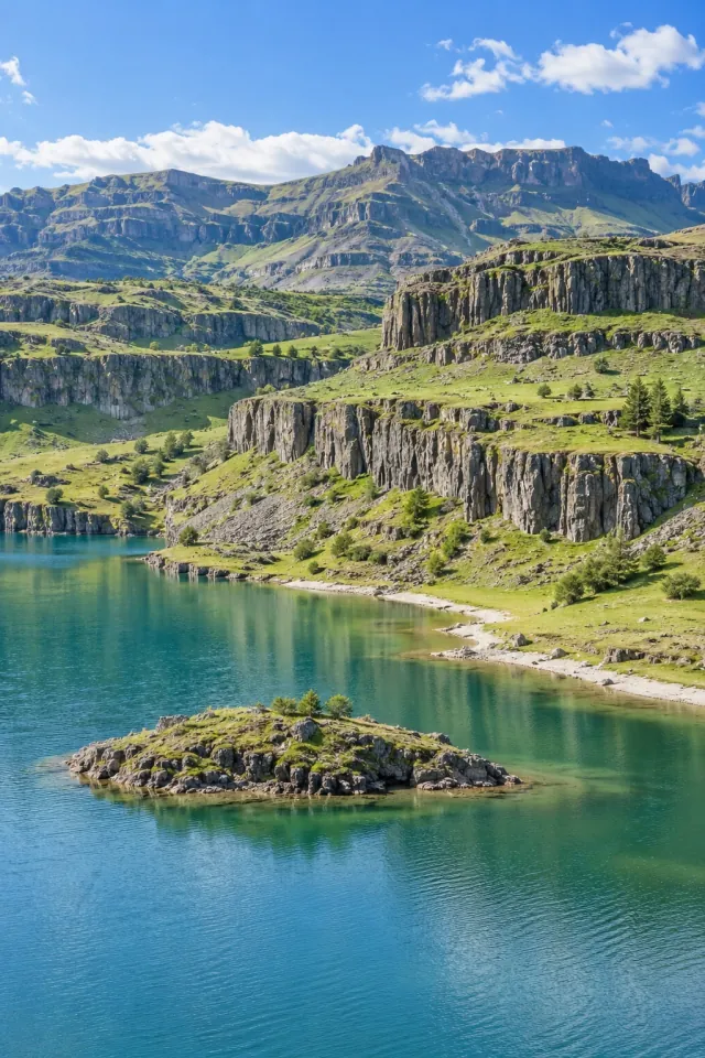 Basalt Ledges beside a Green Mountain Lake