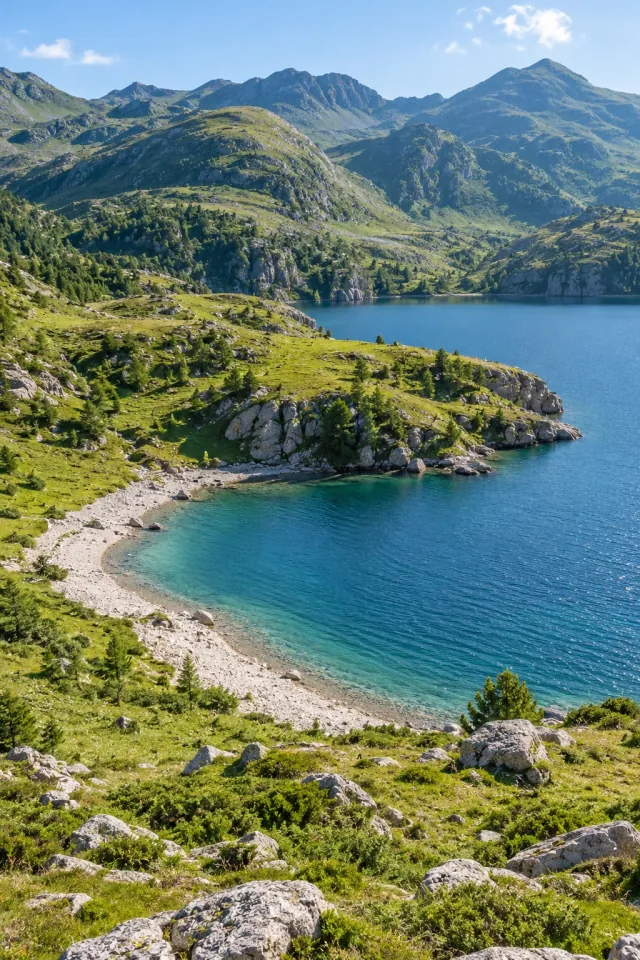 Green Peaks and a Pale Lake Shore