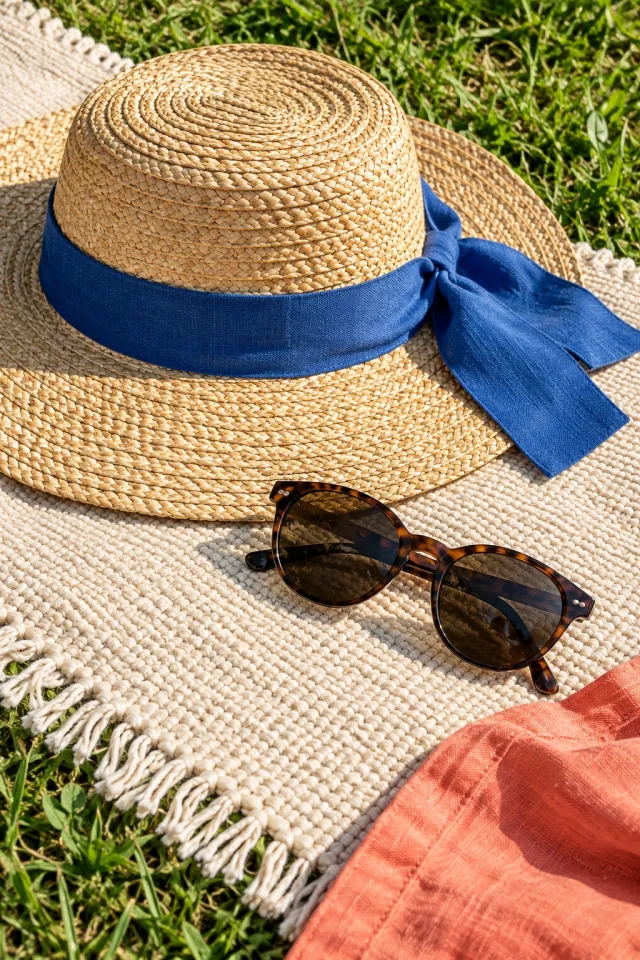 Straw Hat with a Blue Ribbon