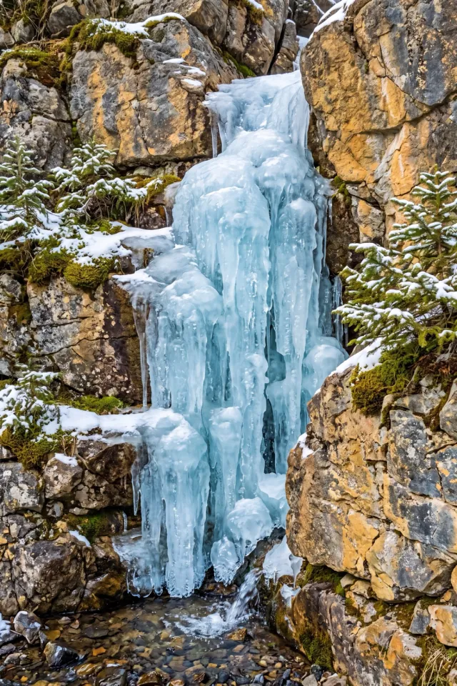 Frozen Cascade in Winter Sun
